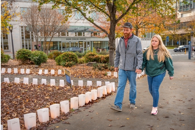 Couple walking outside Duke Cancer Center